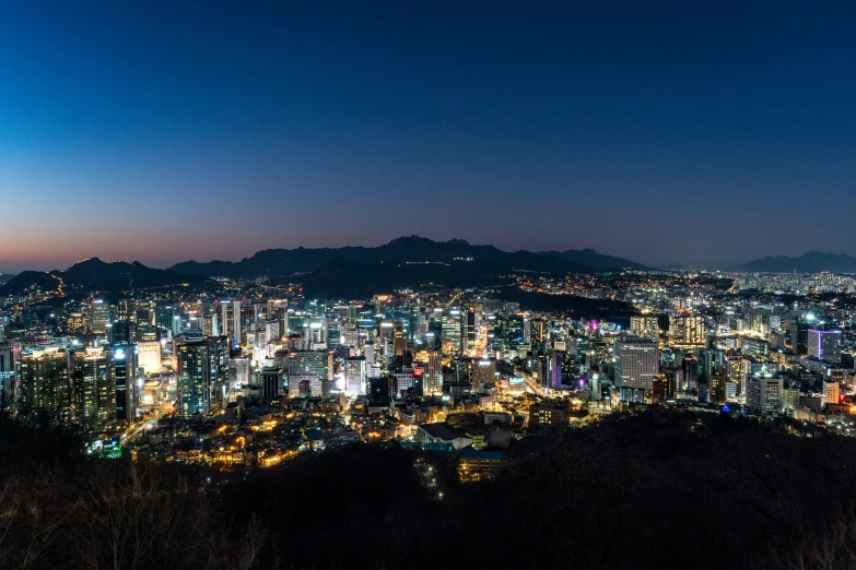 a view of the city of sao from a hill at night