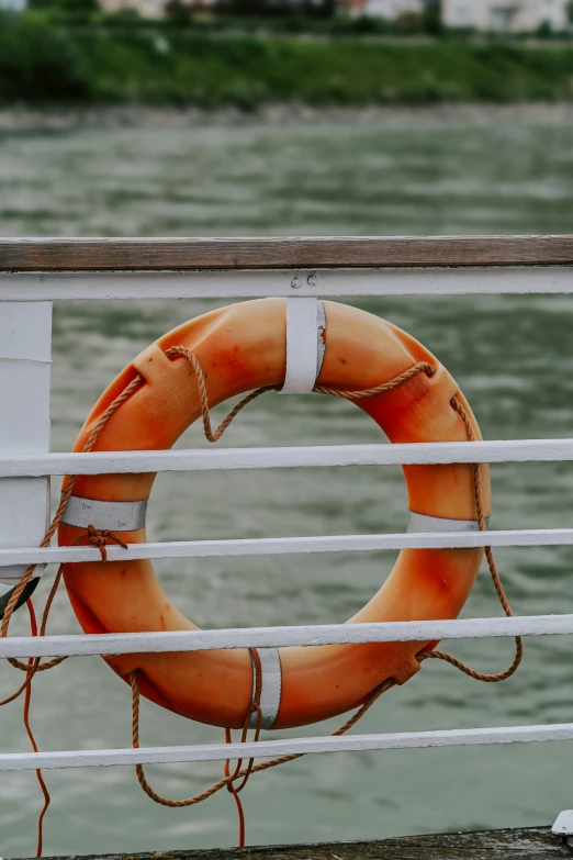 a life preserver on a ship docked by the water