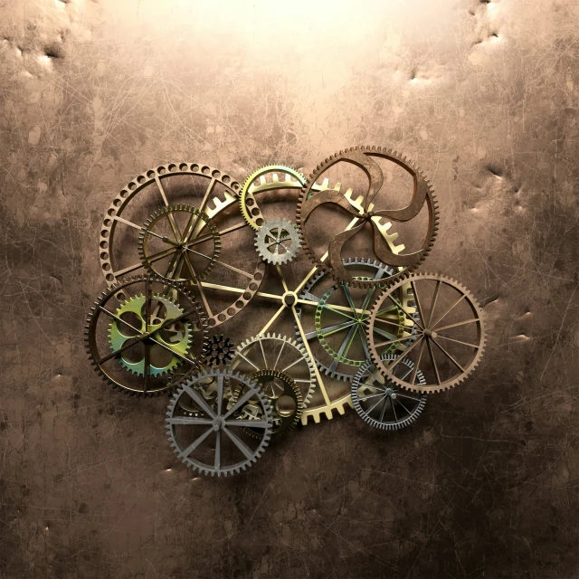 an assortment of gears sitting on top of a brown background