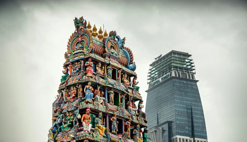 colorful statues on top of a building