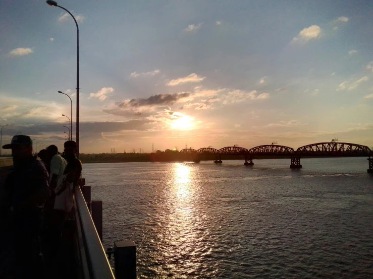 a group of people on a boat ride by water