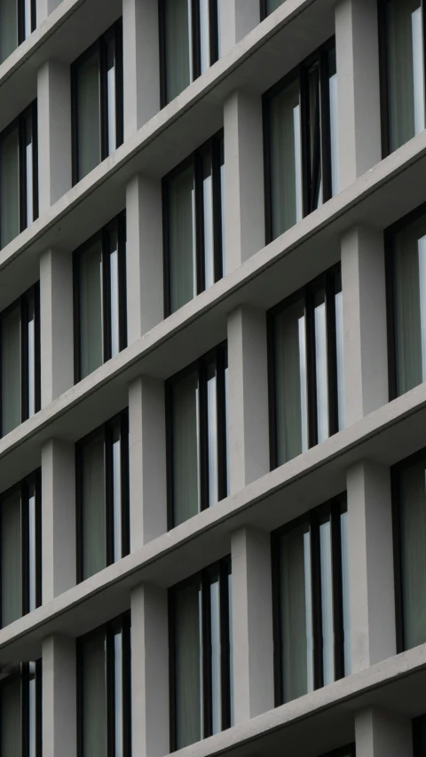 an abstract po of an unfinished facade with windows