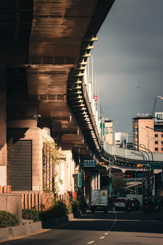 an empty street next to buildings near a train