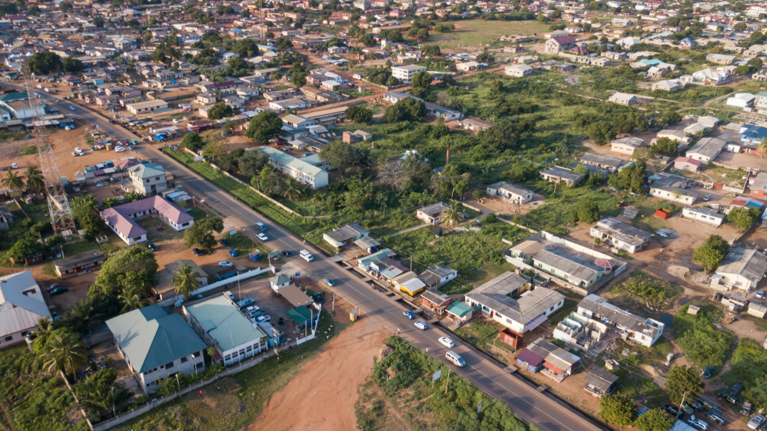 a city with lots of houses and trees