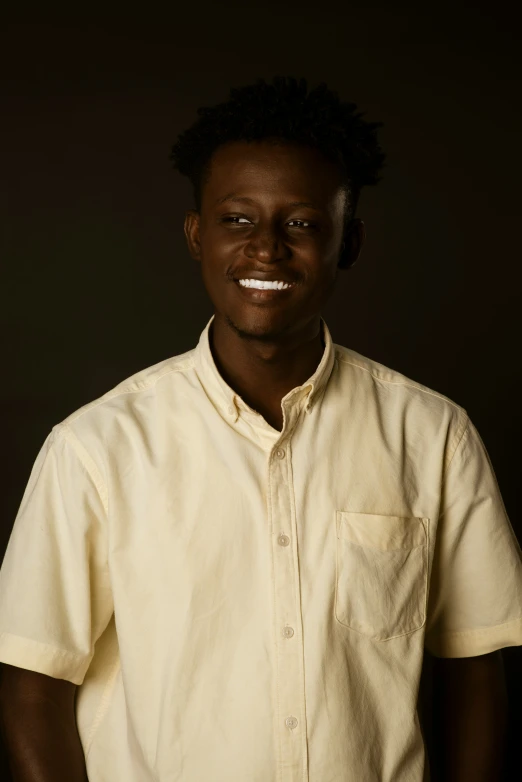 a person in a white shirt and a smile