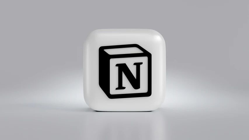 a black and white block with the letter n inside