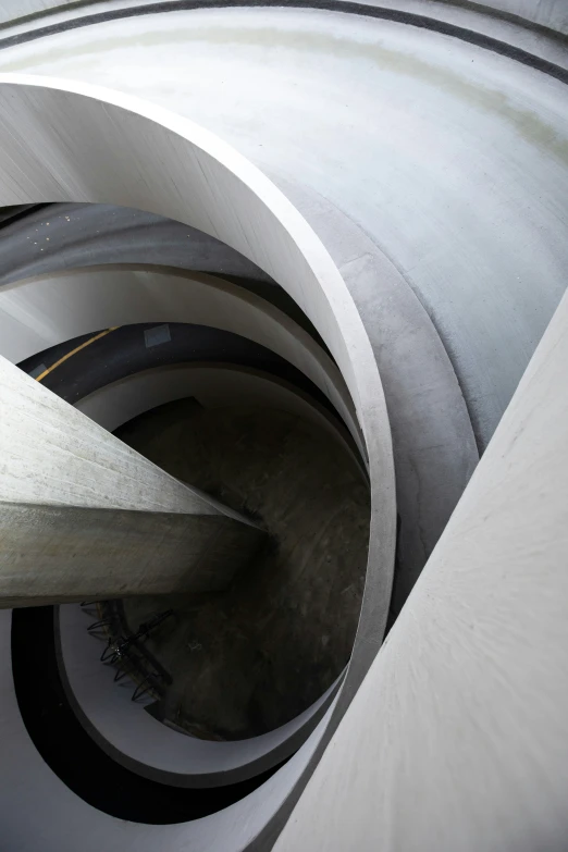 two white tall structures inside a building