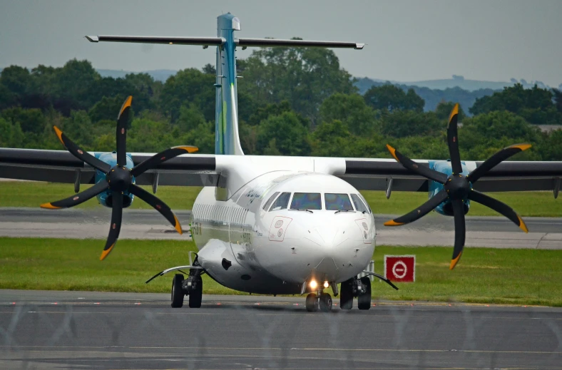 the engine of an airplane is pointed toward the ground