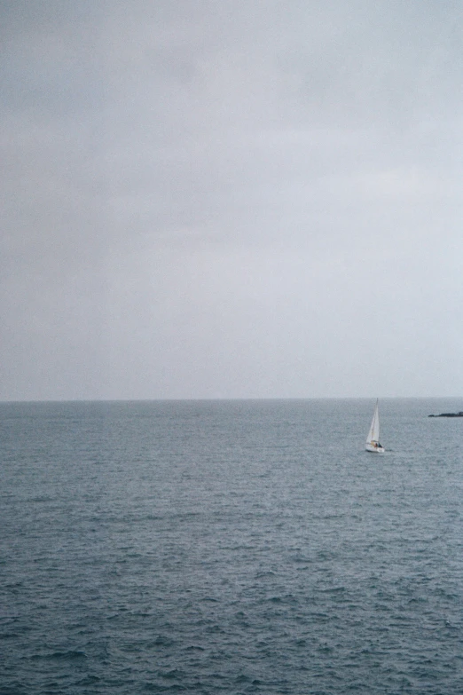 two boats floating on a large body of water