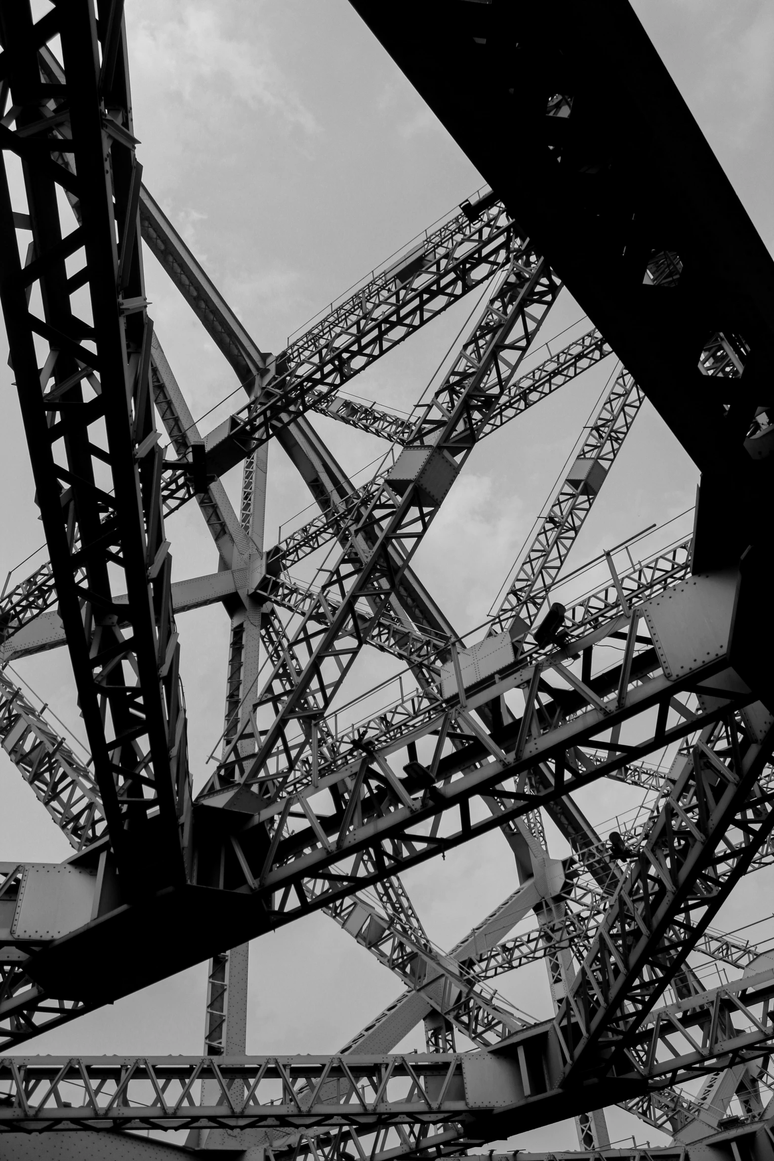 a train bridge with lots of metal supports