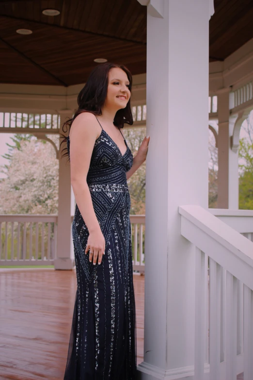 an image of woman standing in a gazebo