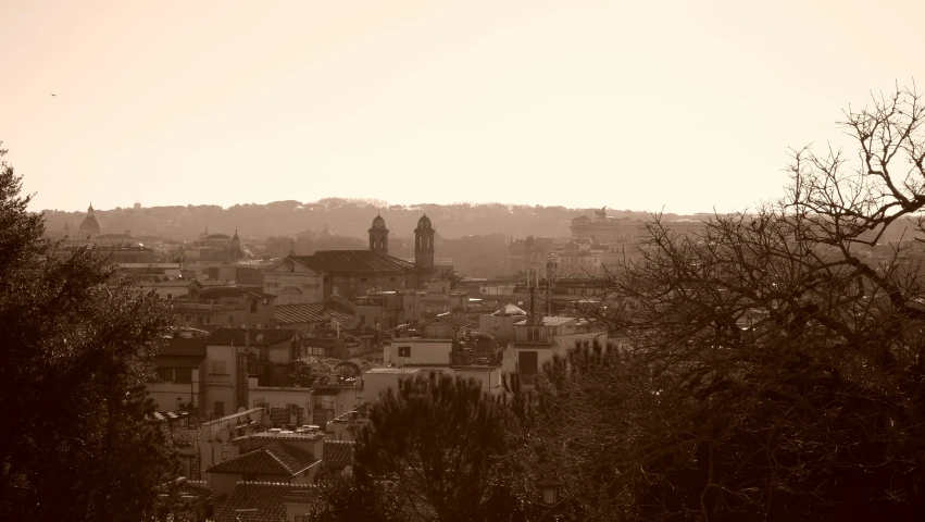 sepia pograph of a city on a hill