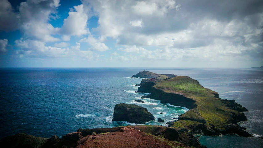 an ocean view of the rocky terrain on the edge