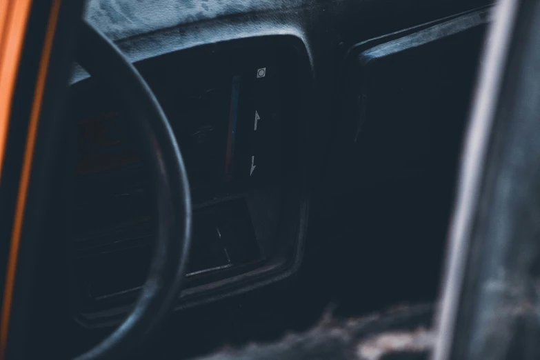 an orange car dash with black trim is shown