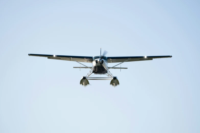 a propeller airplane with its landing gear down