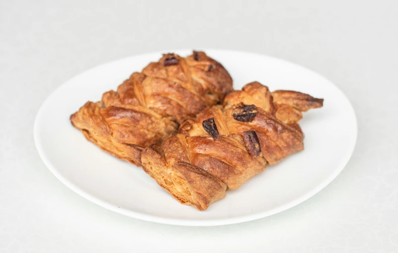 pieces of cinnamon twists are on a plate