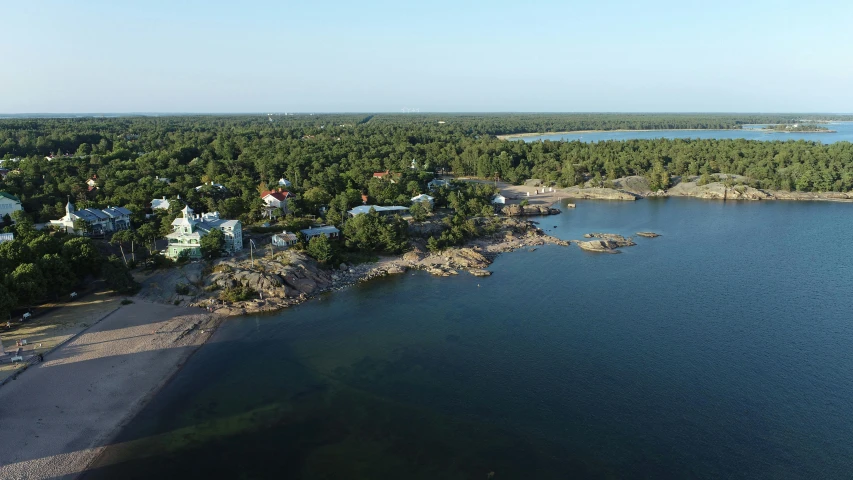 a scenic view of a town and some trees