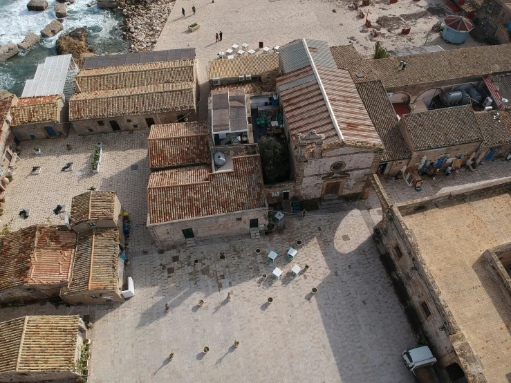 an aerial view of a small town near the ocean