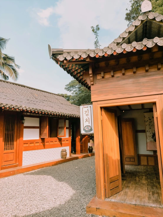 several brown buildings with some doors in it