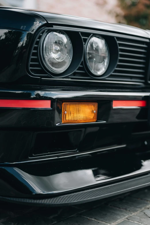 the front end of an old black mustang mustang