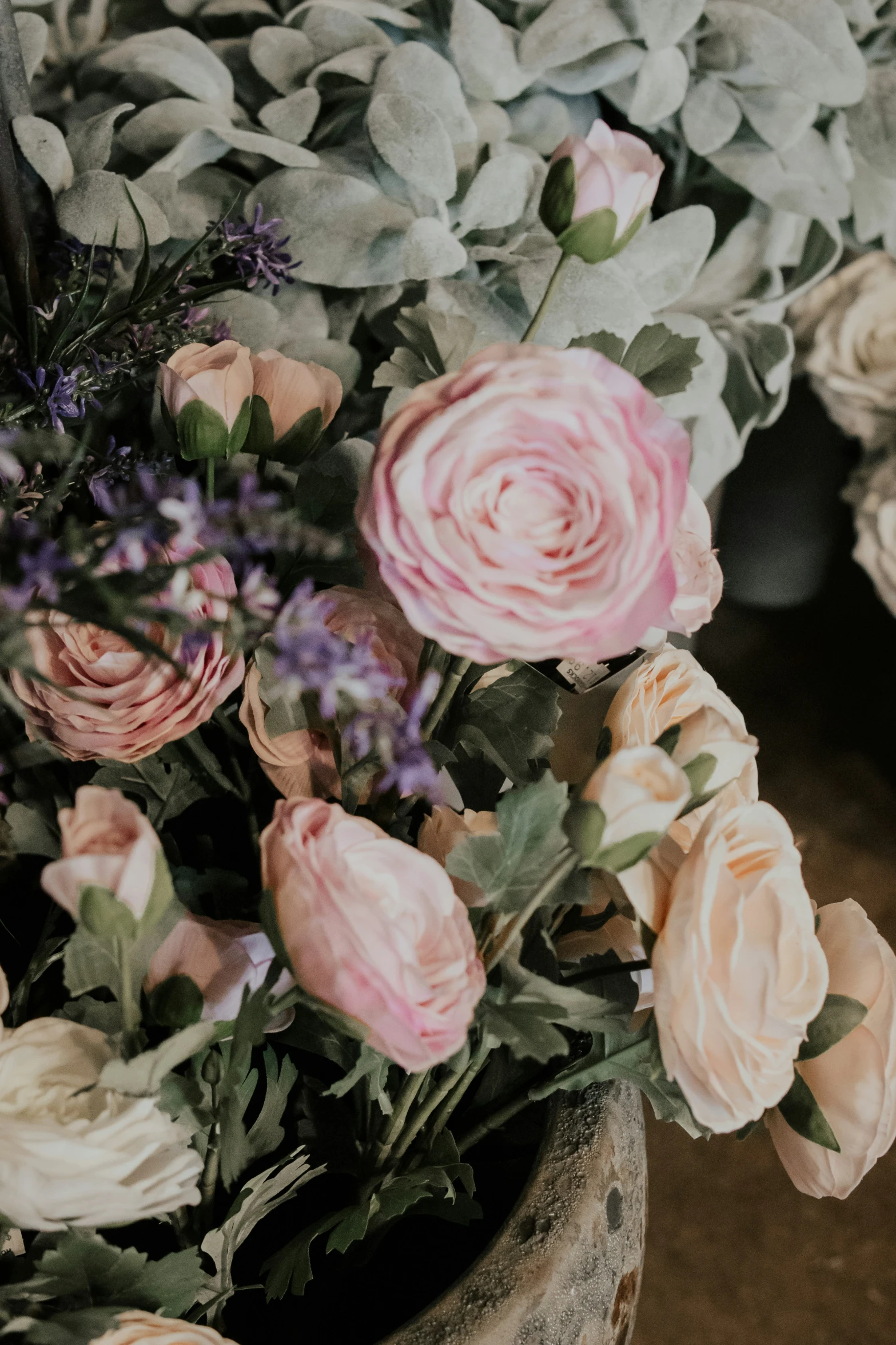 some very pretty flowers in some sort of container