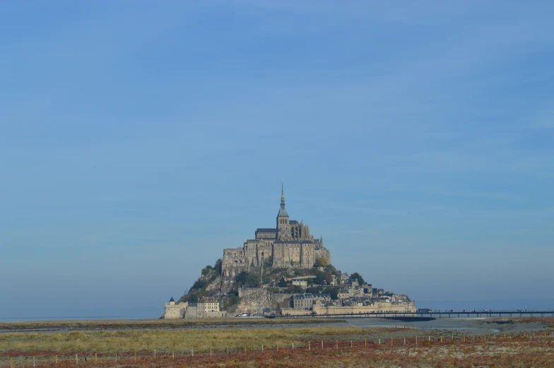 a large structure is built on top of the hill