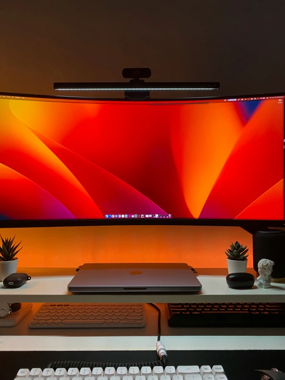 the monitor sits in front of a keyboard and some computer mouse