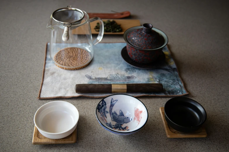 various chinese and chinese bowls and dishes on a tray