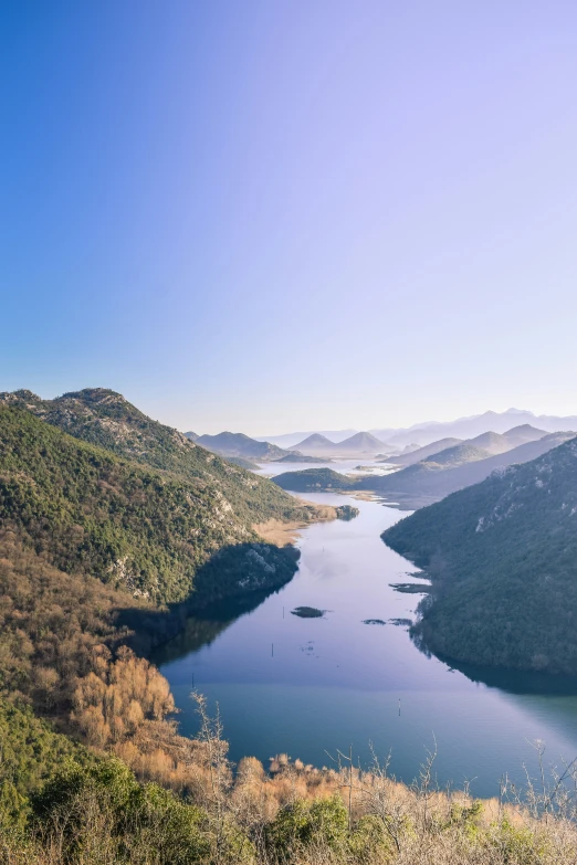 some water and mountains in the distance