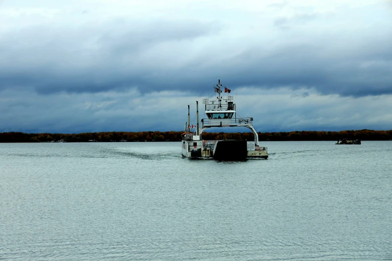 boat with american flag on the mast in calm waters