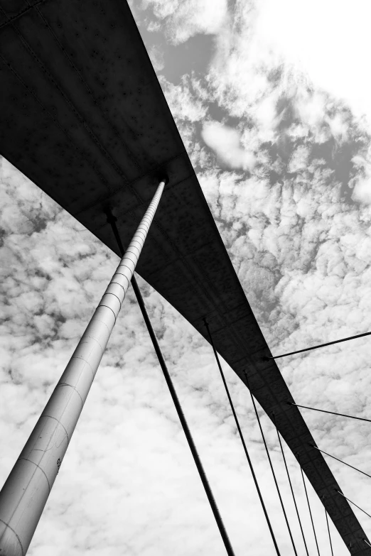 view from under the bridge looking up at the support beams