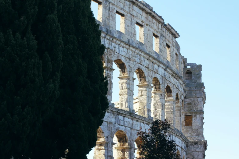 a large building that is white in color