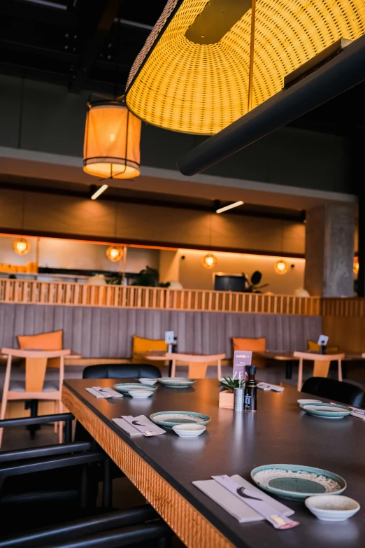 empty tables in a restaurant with wooden furniture