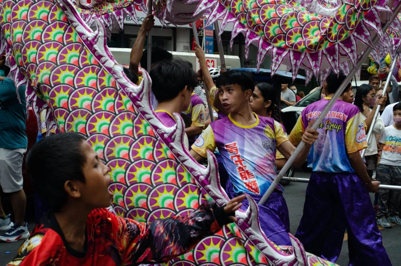 the group of children are doing different costumes