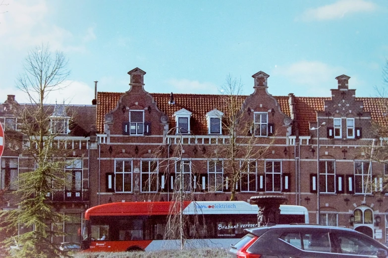 a large building with a street light in front of it