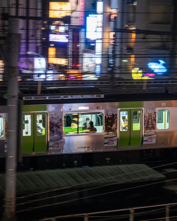 a train traveling through a city at night