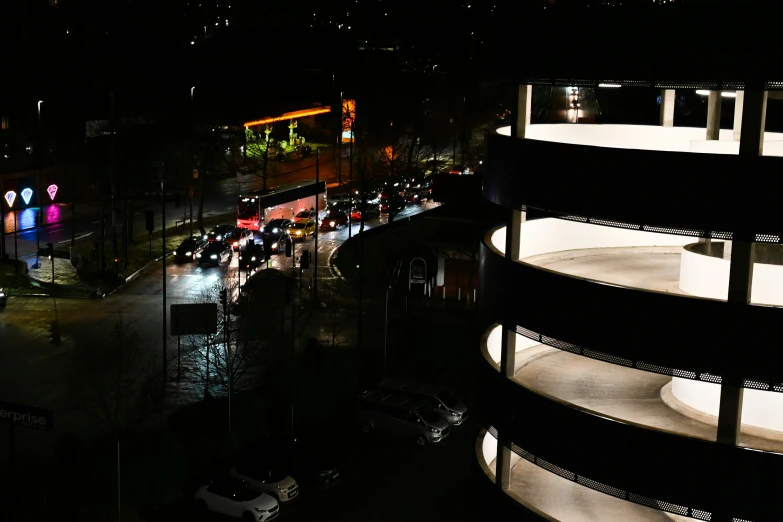 night lights in a city street, as seen from an apartment building