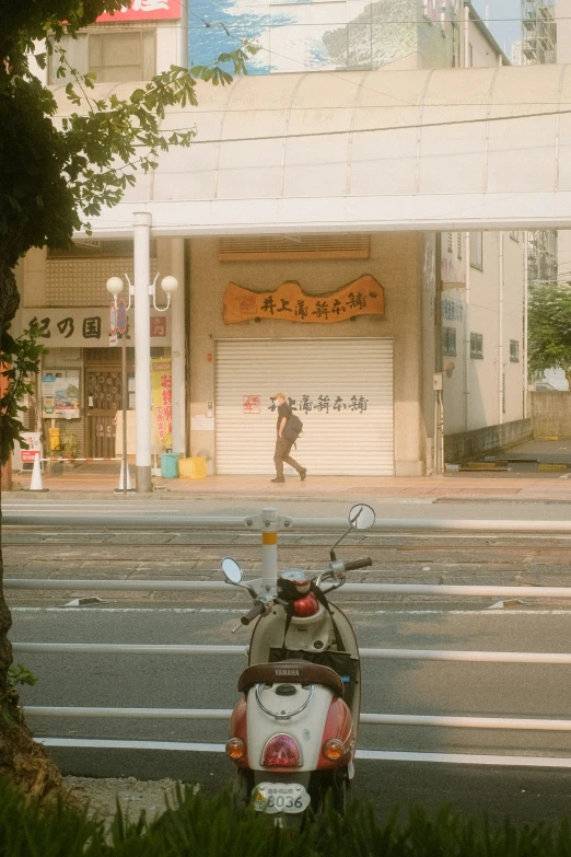 the motorcycle is parked on the side of the road