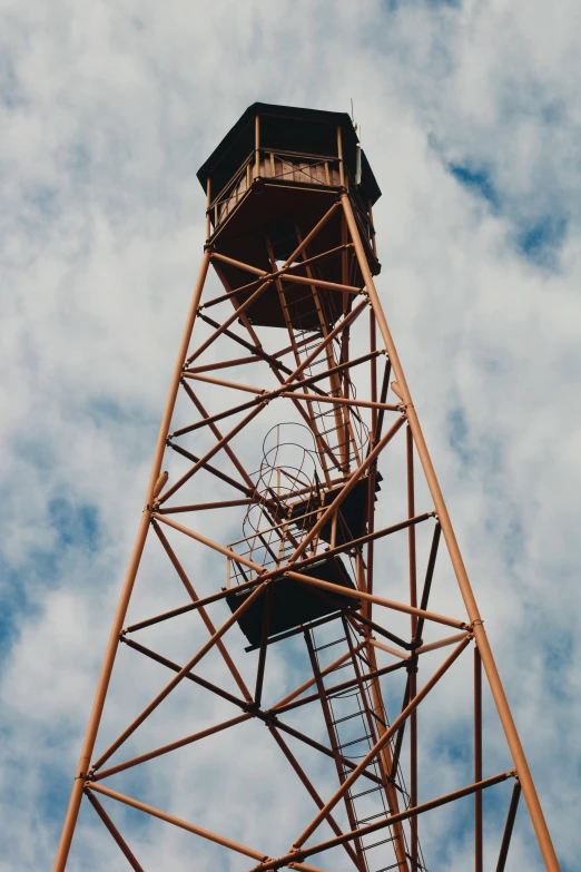 a close up of a tower with a sky background