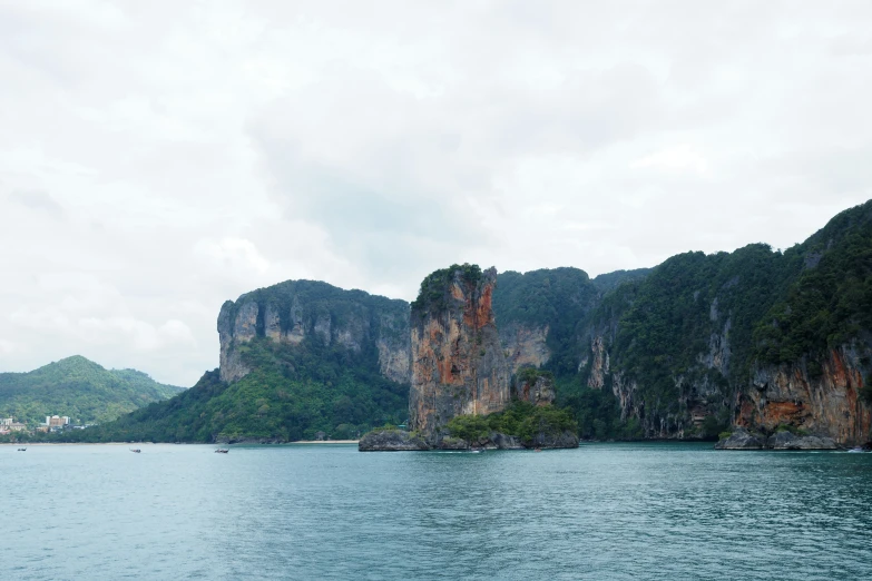 a mountain area with water and mountains next to it