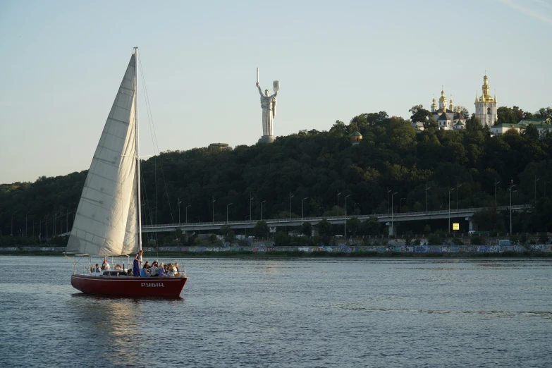 a boat with people on it in the water