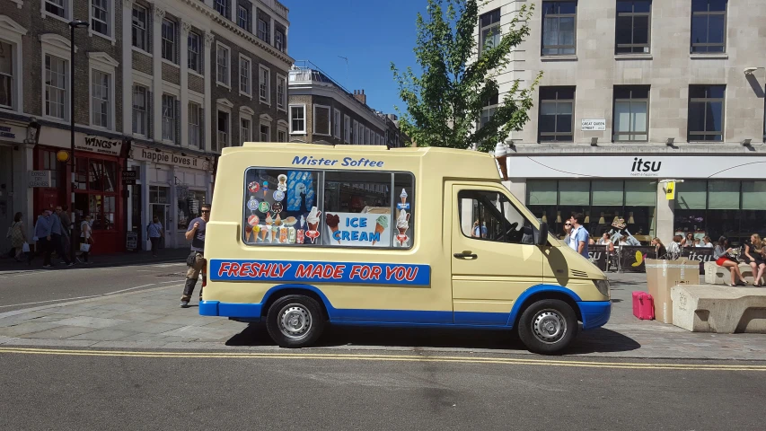 a food truck parked on the side of the street