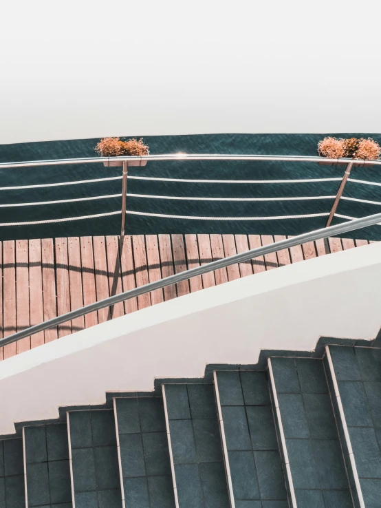 a couple of large planters sitting on top of steps