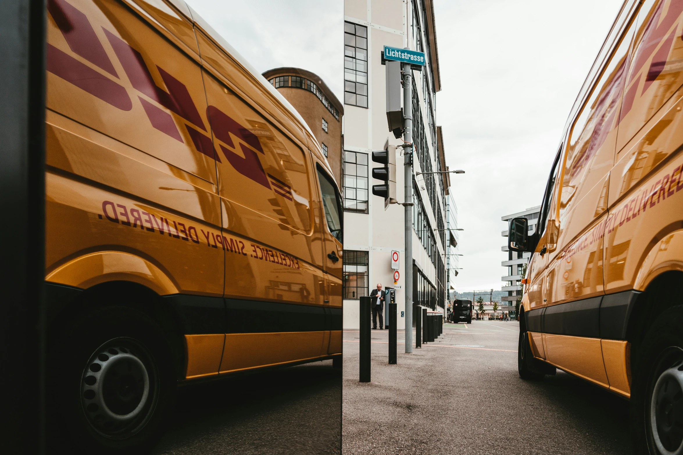 two large yellow buses are parked beside each other