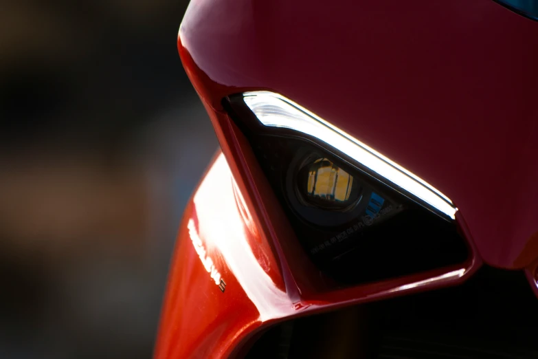 closeup on headlight light on sports motorcycle