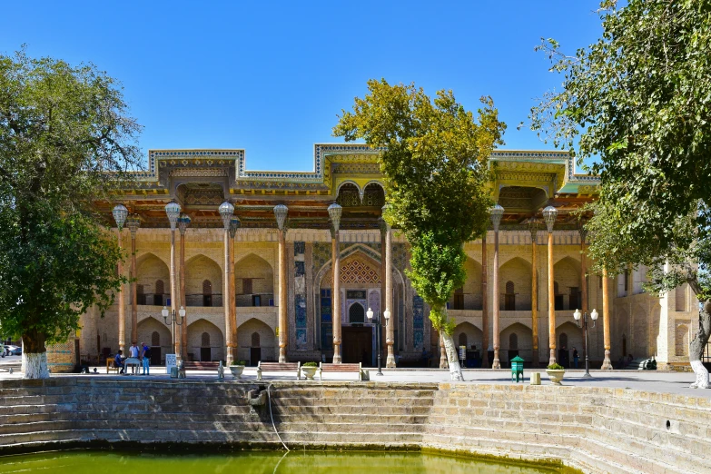 an outside view of a building surrounded by trees