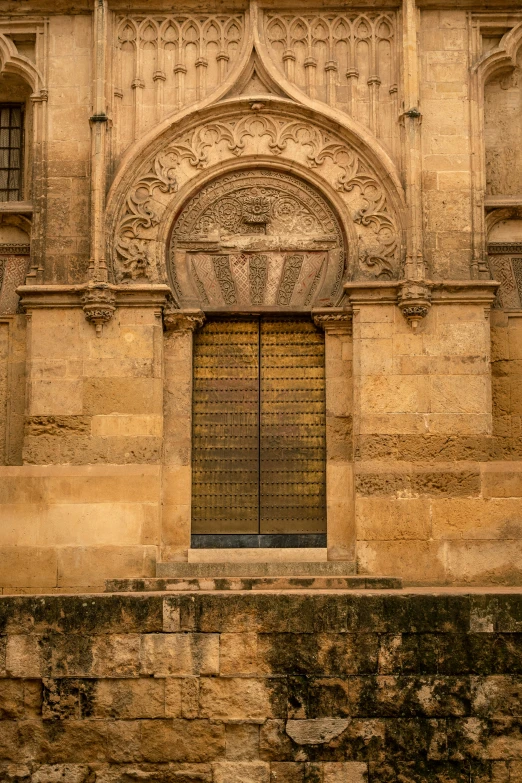 a large entrance to an old building on the wall