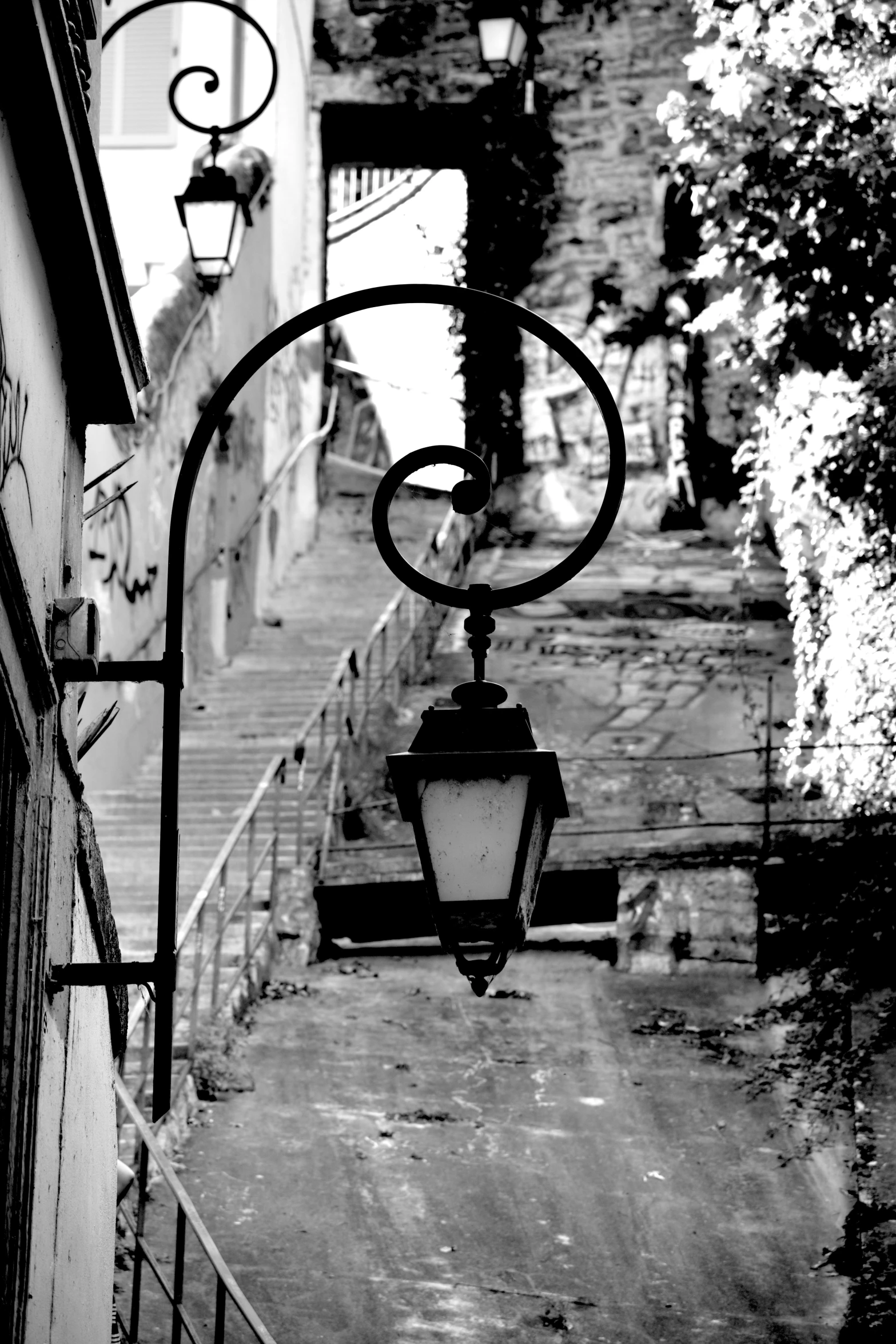 the light is on on the side of the stairs