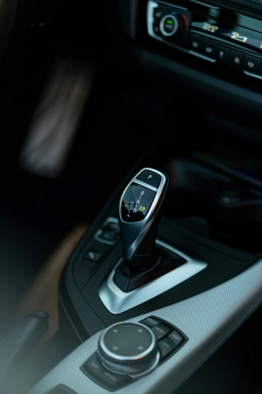 close up of a steering wheel and dashboard with control panel