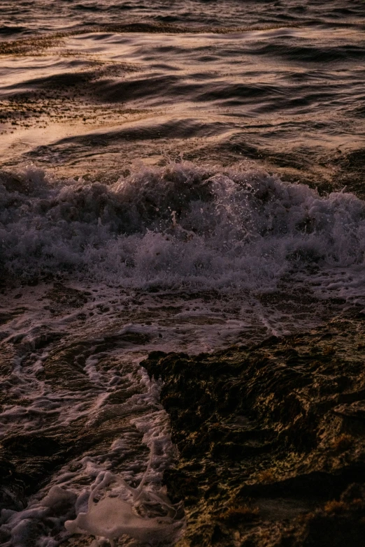 a view of some water on the shore from a beach